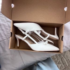 Like new white heels